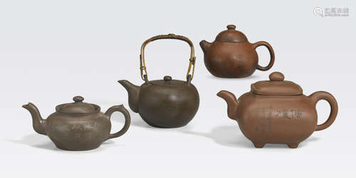 A group of four Yixing pottery teapots