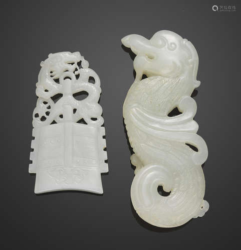 A white jade dragon fish pendant