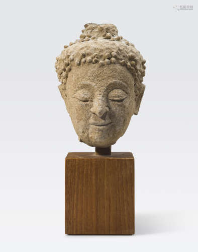 A stucco head of Buddha Thailand, Sukhothai period, circa 14th century