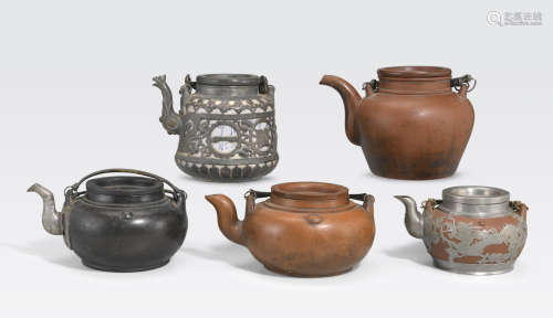 A group of five large metal-mounted Yixing pottery teapots