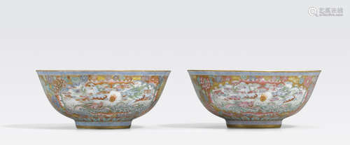 A pair of famille rose enameled and gilt painted dragon bowls Qianlong marks, Republic period