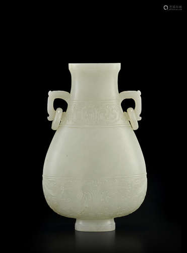 A fine archaistic very pale greenish-white jade vase Qianlong period