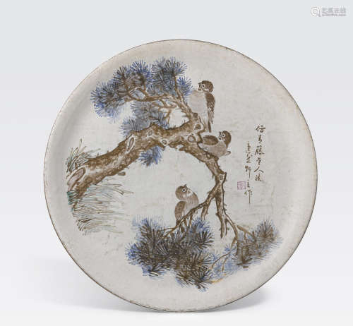 An Yixing pottery plate with enameled decoration