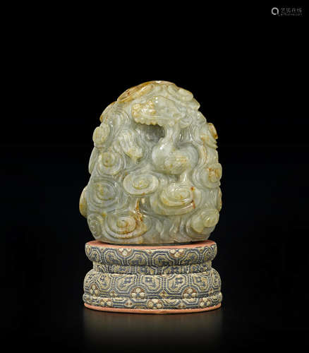 A celadon and russet jade cloud-form finial Qing dynasty