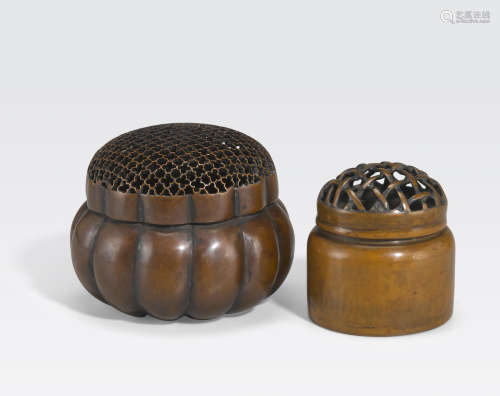 Two small copper alloy handwarmers 17th/18th century
