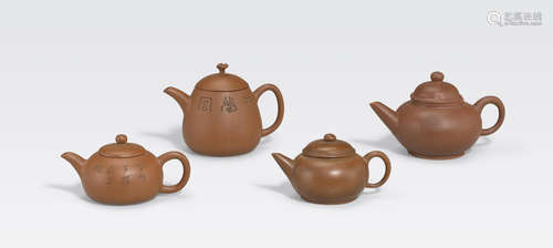 A group of four miniature Yixing teapots