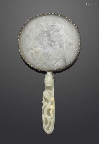 Two jade carvings mounted on a hand mirror 18th/19th century (the jade carvings)