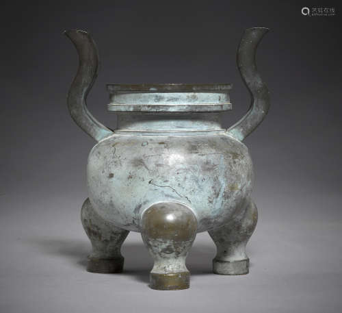 A cast bronze tripod censer Qianlong mark and of the period