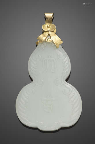 A pale greenish-white jade double gourd pendant 18th century