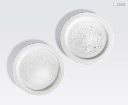 A pair of Dehua incised 'dragon' dishes Qing dynasty