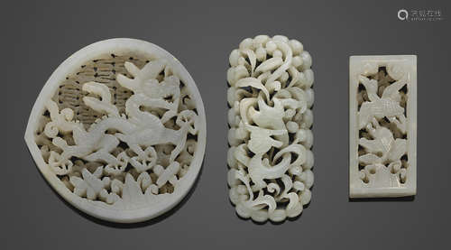 A group of three reticulated jade belt plaques Ming/Qing dynasty