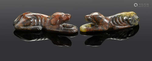 Two reddish-brown jade recumbent hounds Tang dynasty or later