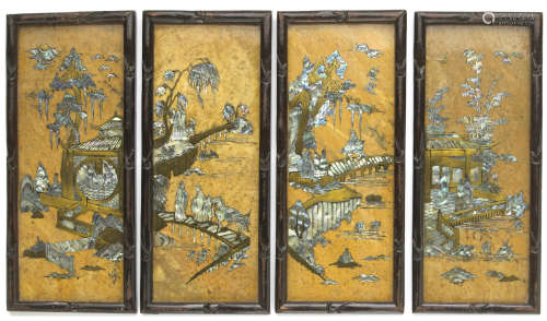 A set of four soapstone wall panels with cut metal and mother-of-pearl inlay 20th century