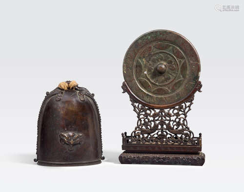 A cast bronze bell and mirror Qing dynasty