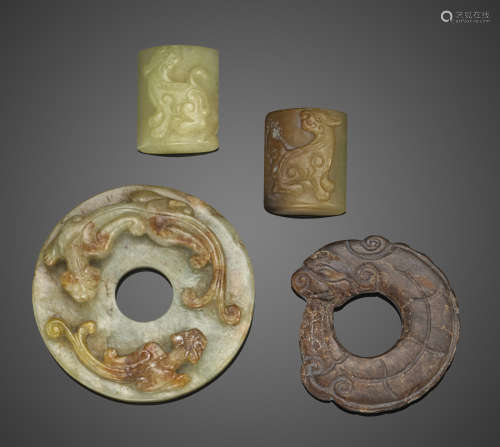 A group of four small jade and hardstone carvings