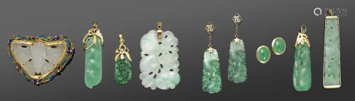 A group of jade and jadeite-mounted jewelry