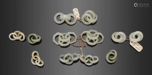 A group of six pairs of reticulated jade earrings