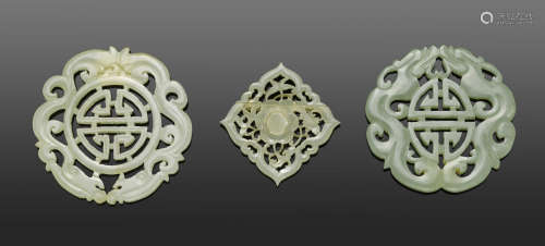 A group of three reticulated jade decorations Qing dynasty