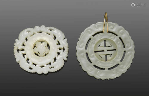 Two jade pendants with movable center roundels
