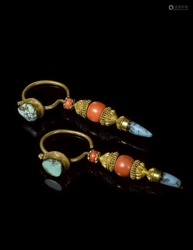 A pair of turquoise and coral earrings Tibet, 19th/20th century