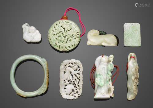 a group of seven small jade carvings