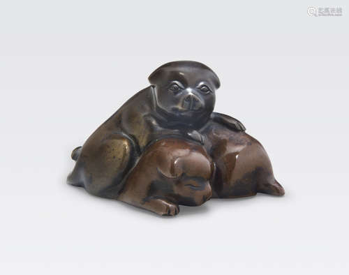 A bronze okimono of puppies 19th century