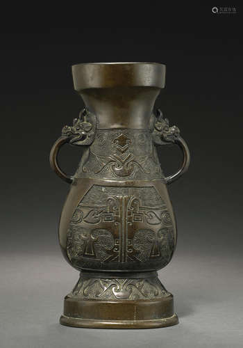 A cast bronze hu-form vase with handles Qing dynasty