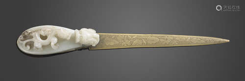 A gray jade belt hook mounted as a letter opener