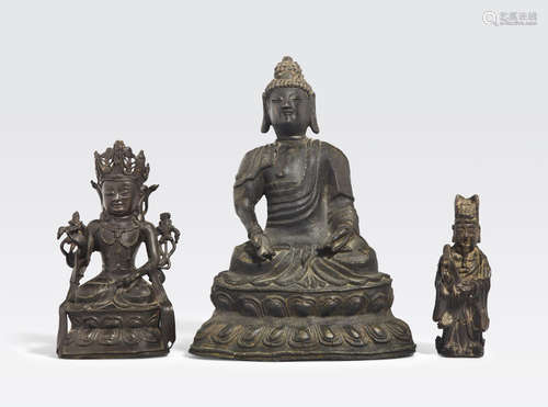 A group of three cast bronze figures Ming dynasty