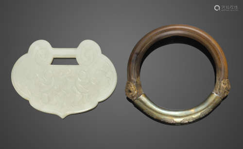 A white jade pendant and a rattan bangle