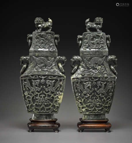 A pair of large spinach jade vases and covers First half of 20th century