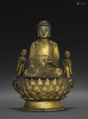 A rare gilt bronze group of Buddha and attendants Ming Dynasty