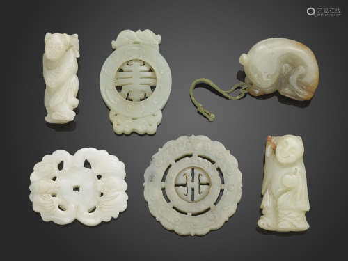 A group of six jade toggles and pendants