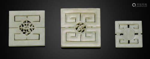 A group of three square wan-character jade plaques Late Qing dynasty