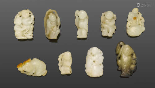 A group of nine jade carvings of children