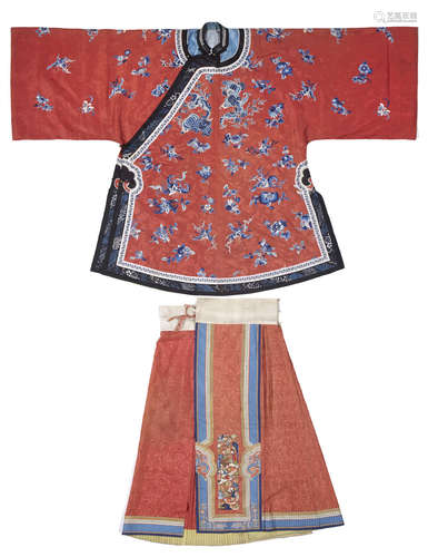 A woman's embroidered red silk brocade informal coat and pleated skirt Late Qing dynasty