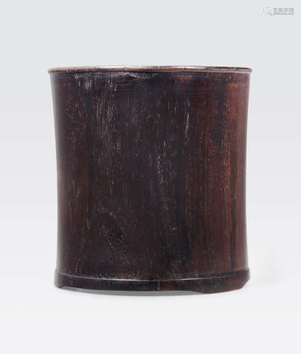 A carved zitan brush pot