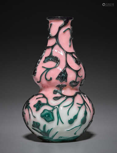 A marbled pink and white Peking glass double gourd vase with green overlay decoration 20th century