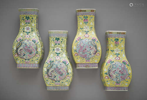 A set of four yellow ground wall vases with famille rose decoration Late Qing/Republic period