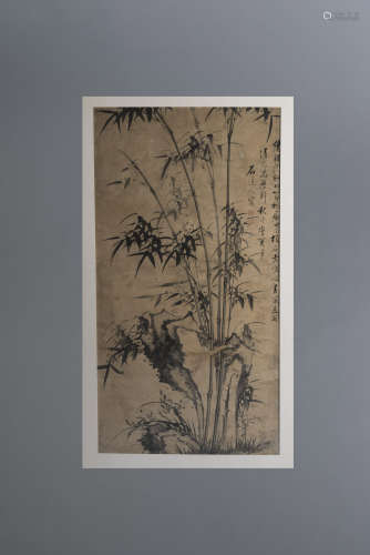 Peinture à l’encre sur papier représentant bambous et rochers.
