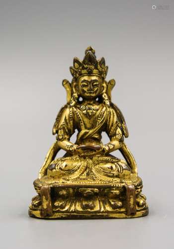 CHINESE TIBETAN GILT BRONZE SITTING BUDDHA