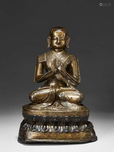 STATUETTE DE   MOINE EN BRONZE, TIBET, XVIe SIÈCLE