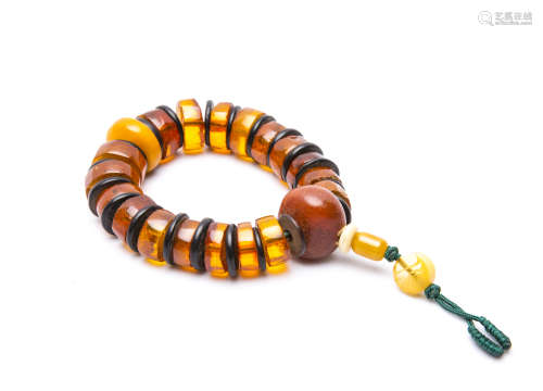 A Chinese Amber Prayer Beads