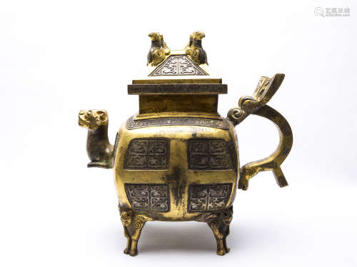 A Chinese Gilt Bronze Four-Foot Box