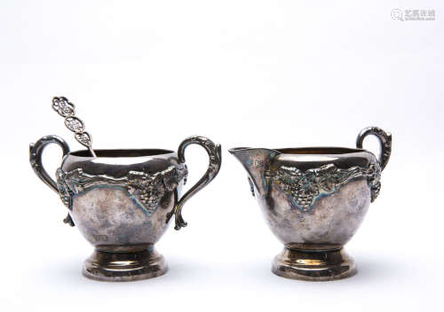 A Set of Three Silver Cups and Spoon