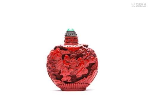 A Chinese Carved Cinnabar Snuff Bottle