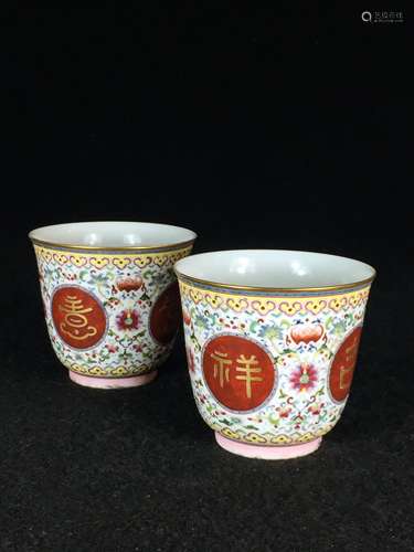 PAIR OF CHINESE FAMILLE ROSE CUPS