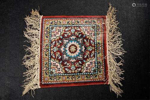 A PERSIAN RUG