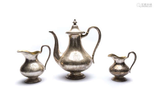 A set of three Pieces Silver Teapot and Cups