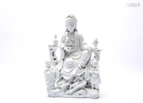 A Chinese Porcelain Guanyin and Kid